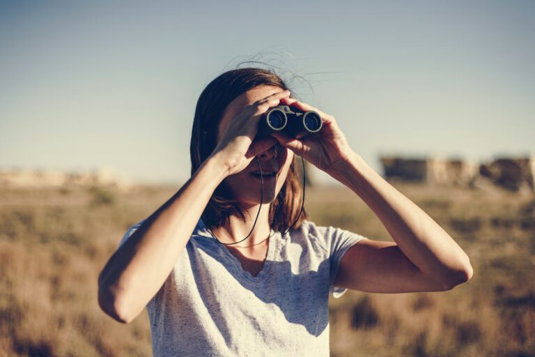 Traveler Using Binoculars